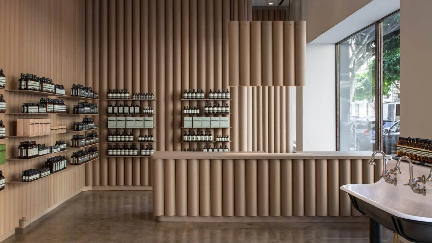 Brooks + Scarpa recycles cardboard tubes and paper for Los Angeles Aesop store interior — Dezeen